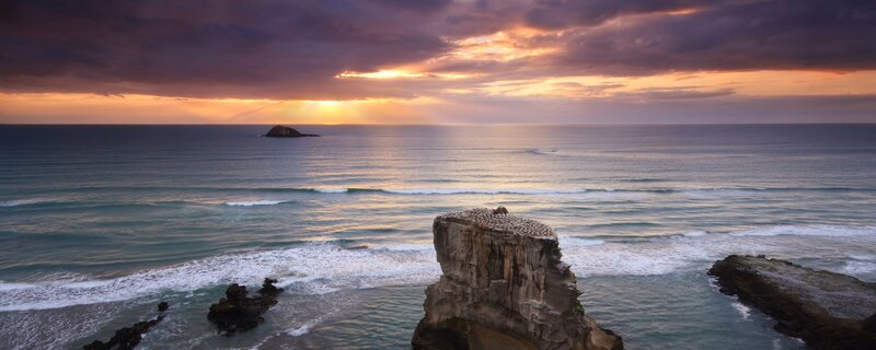 Sunset over coastal cliffs