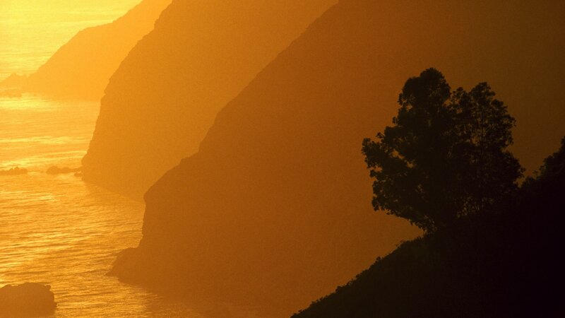 Sunset over coastal cliffs