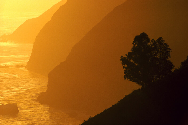 Sunset over coastal cliffs