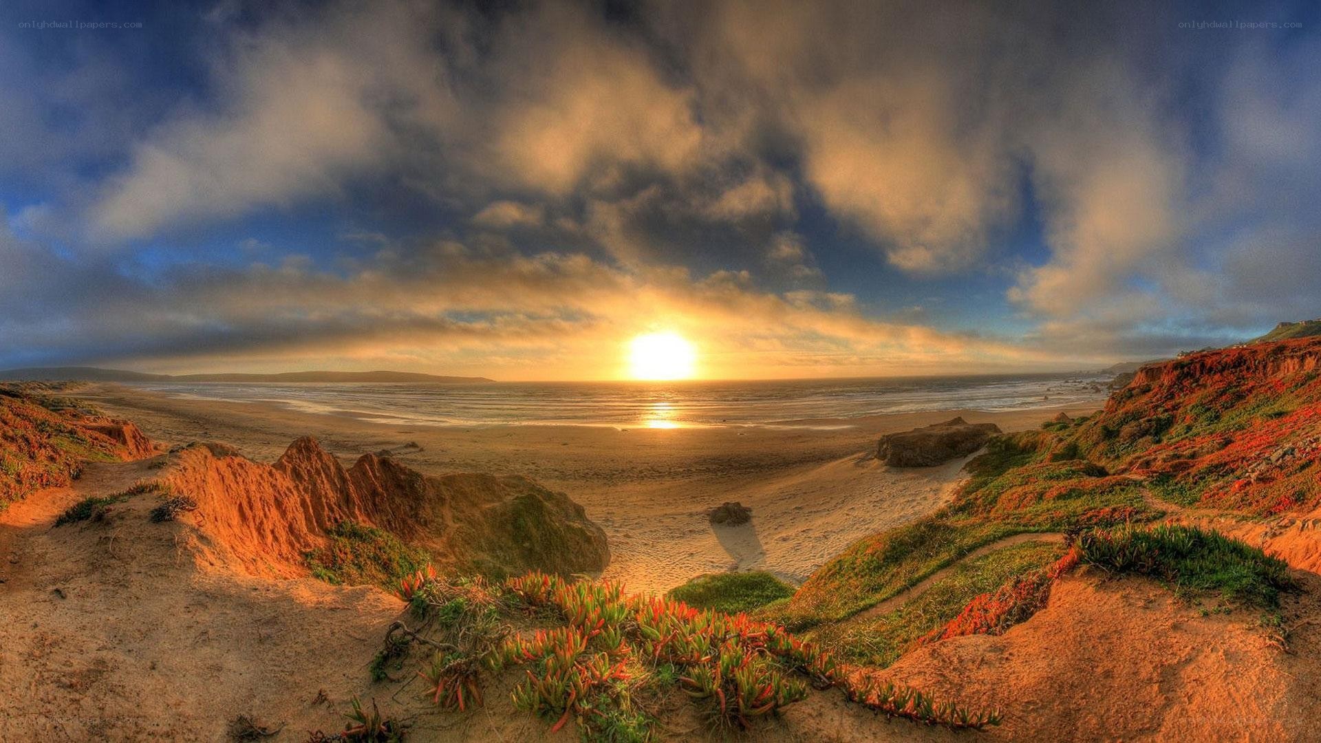 sunset over coastal cliffs