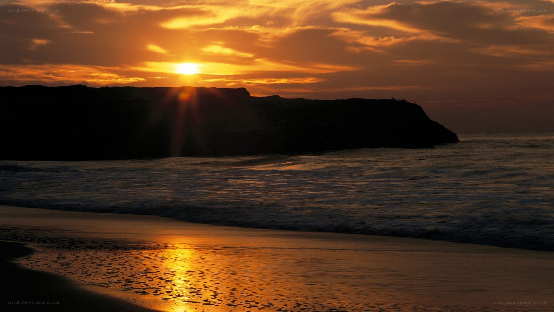 sunset over coastal cliffs