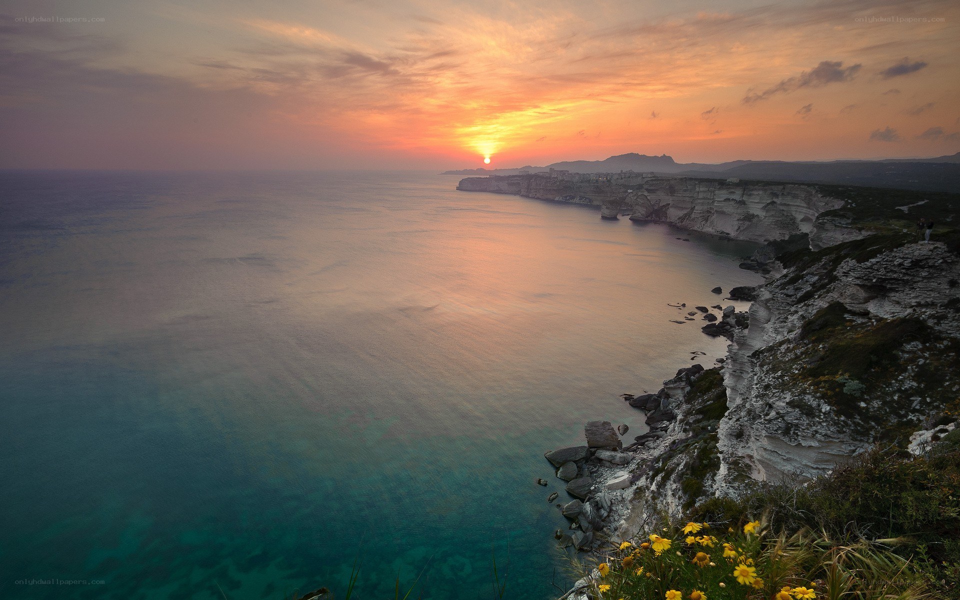 Sunset over coastal cliffs