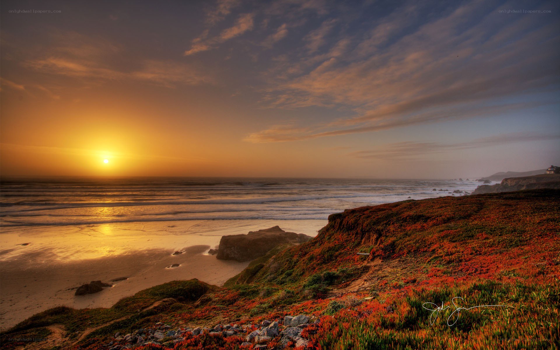 sunset over coastal cliffs