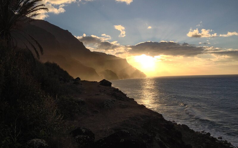 Sunset over coastal cliffs
