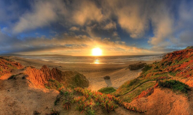 Sunset over Coastal Cliffs — Blue