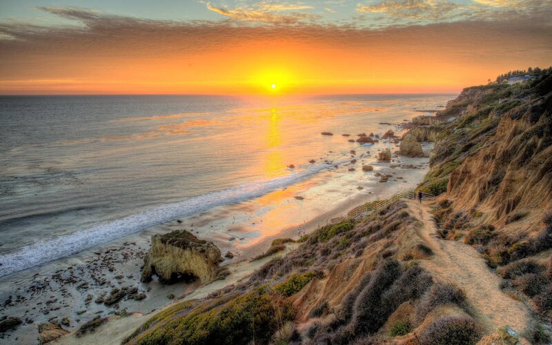 Sunset over Coastal Cliffs — Orange, Serene, Photograph, Ocean