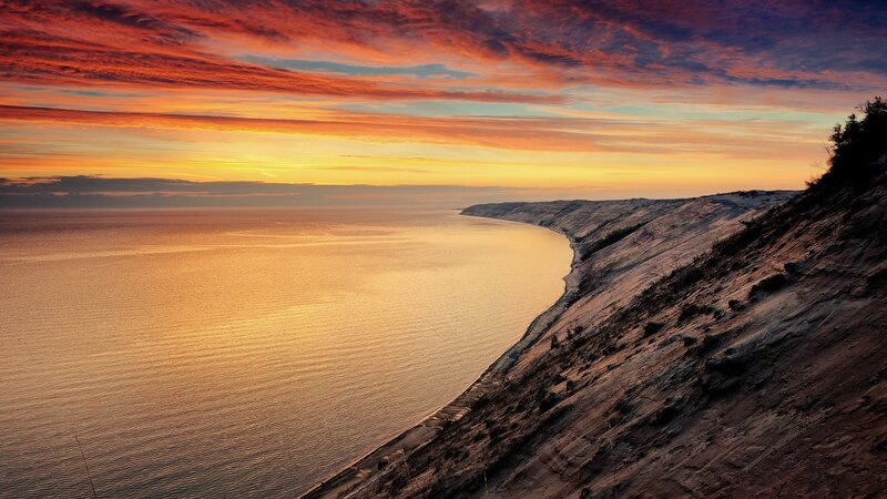 Sunset over Coastal Cliffs — Orange, Serene, Photograph