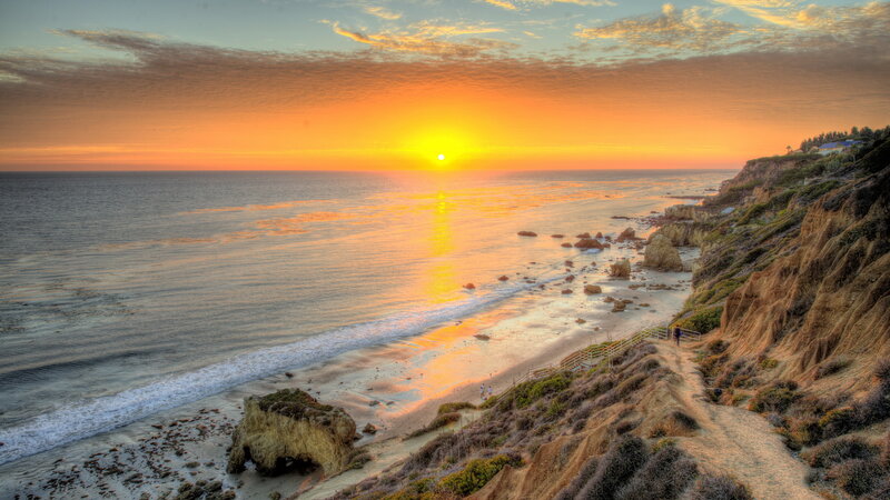Sunset over Coastal Cliffs — Orange, Serene