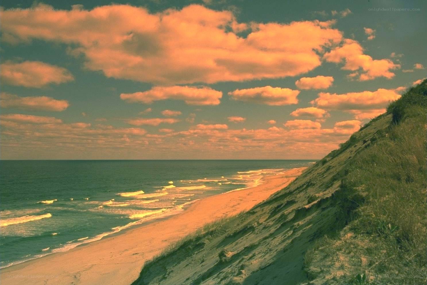 sunset over coastal dunes