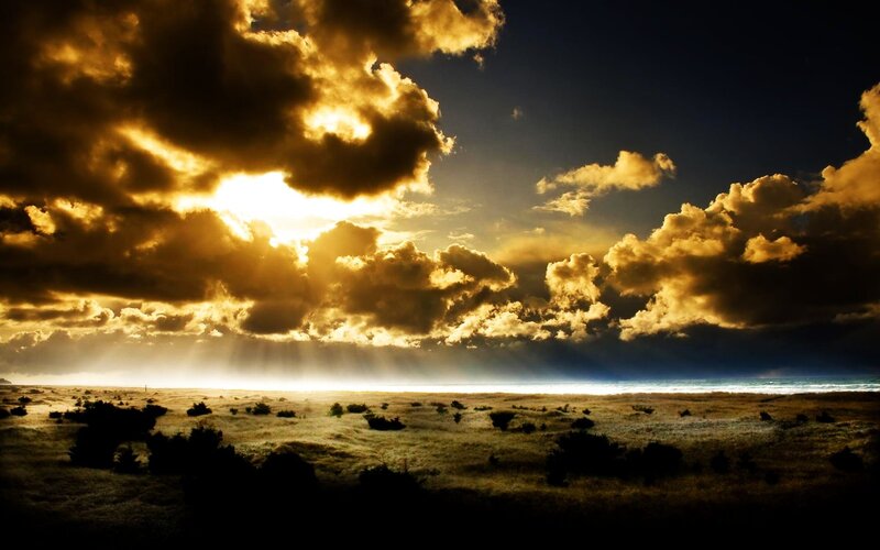 Sunset over coastal dunes