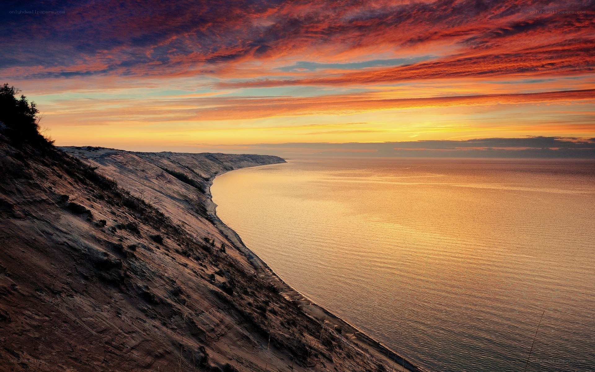 sunset over coastal dunes