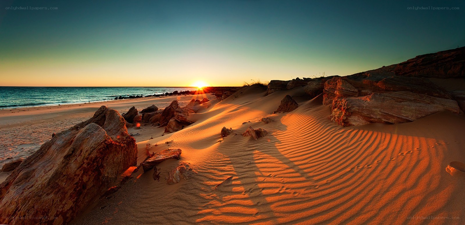 Sunset over coastal dunes