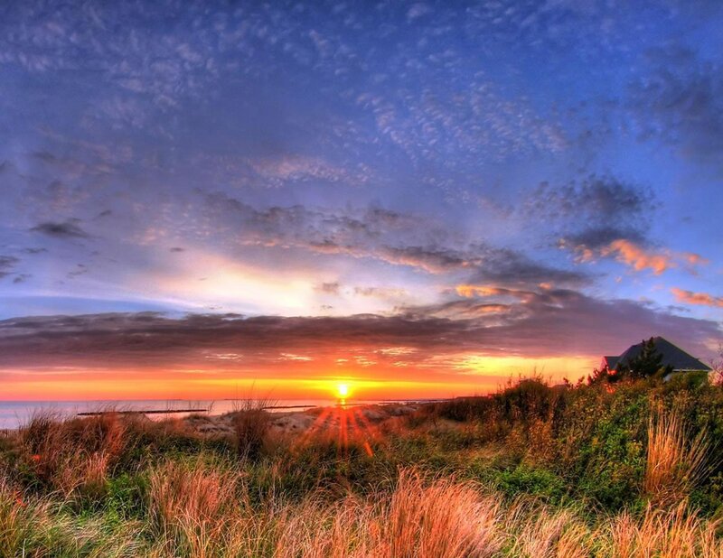 Sunset over coastal dunes