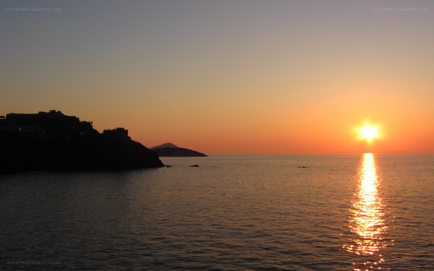 Sunset over coastal fortress