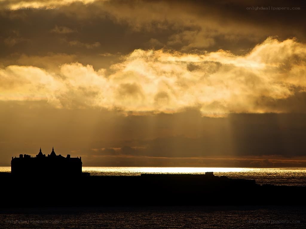 Sunset over coastal fortress