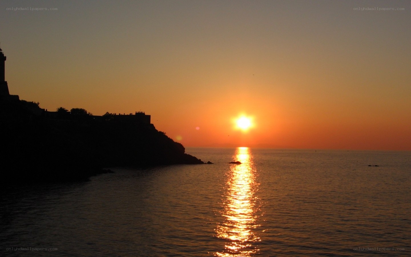 sunset over coastal fortress