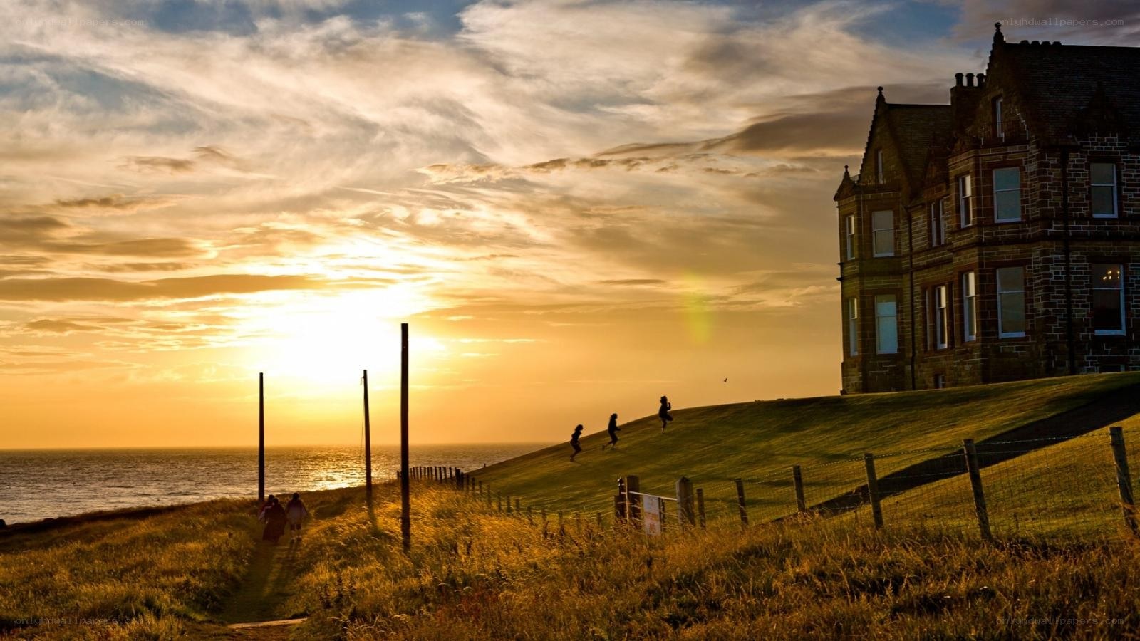 Sunset over coastal hill