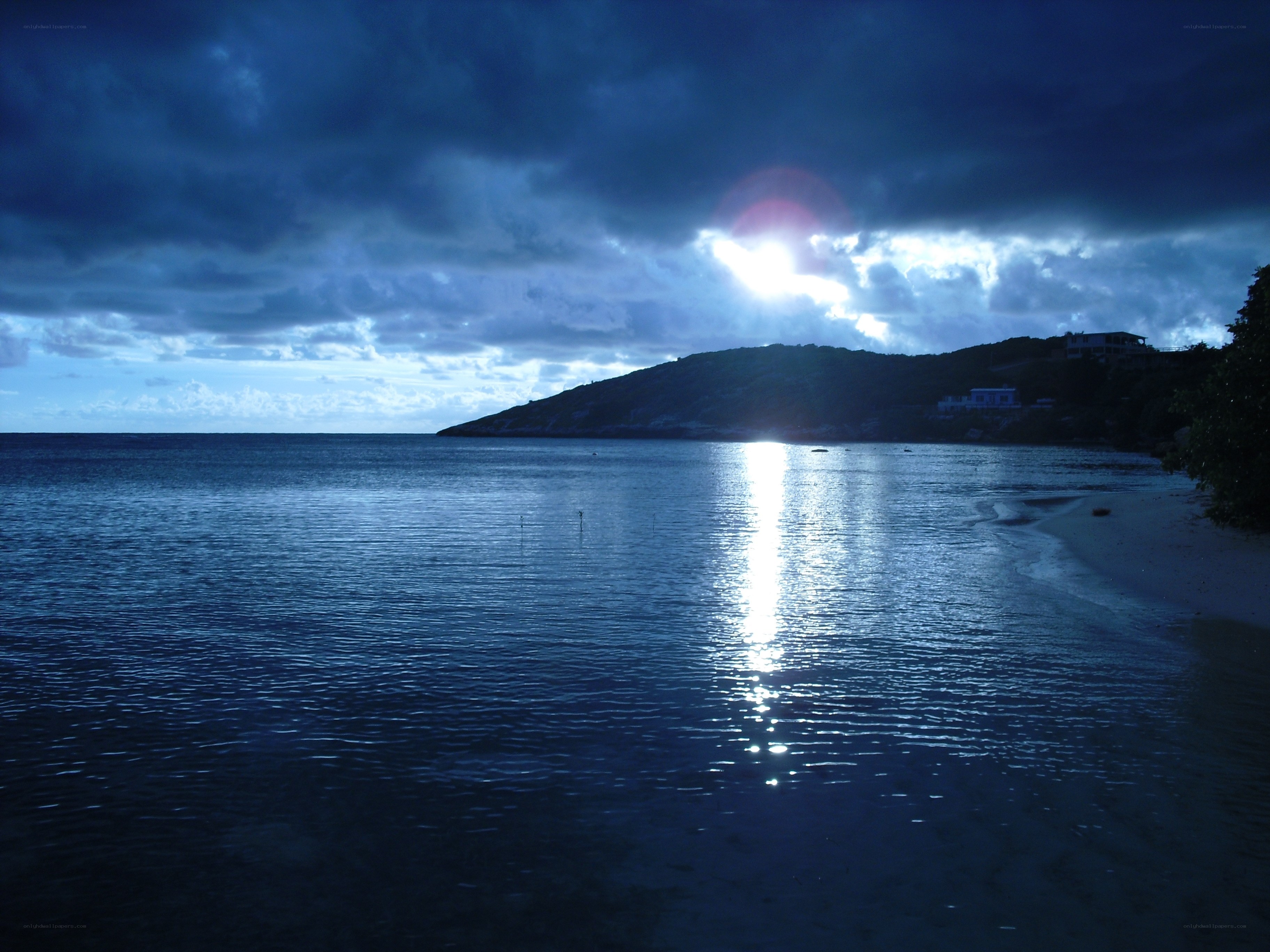 Sunset over coastal hill