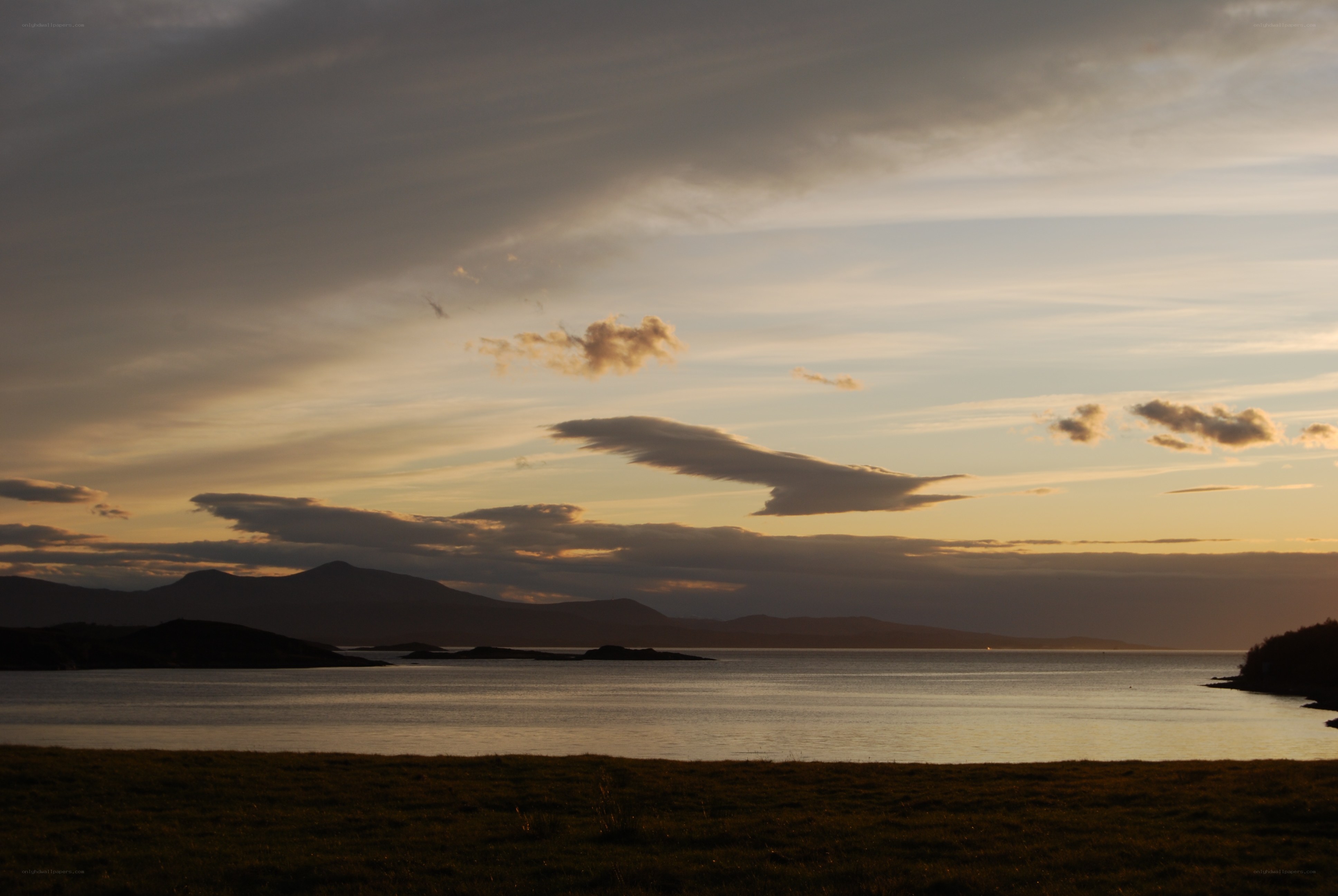 Sunset over coastal hills