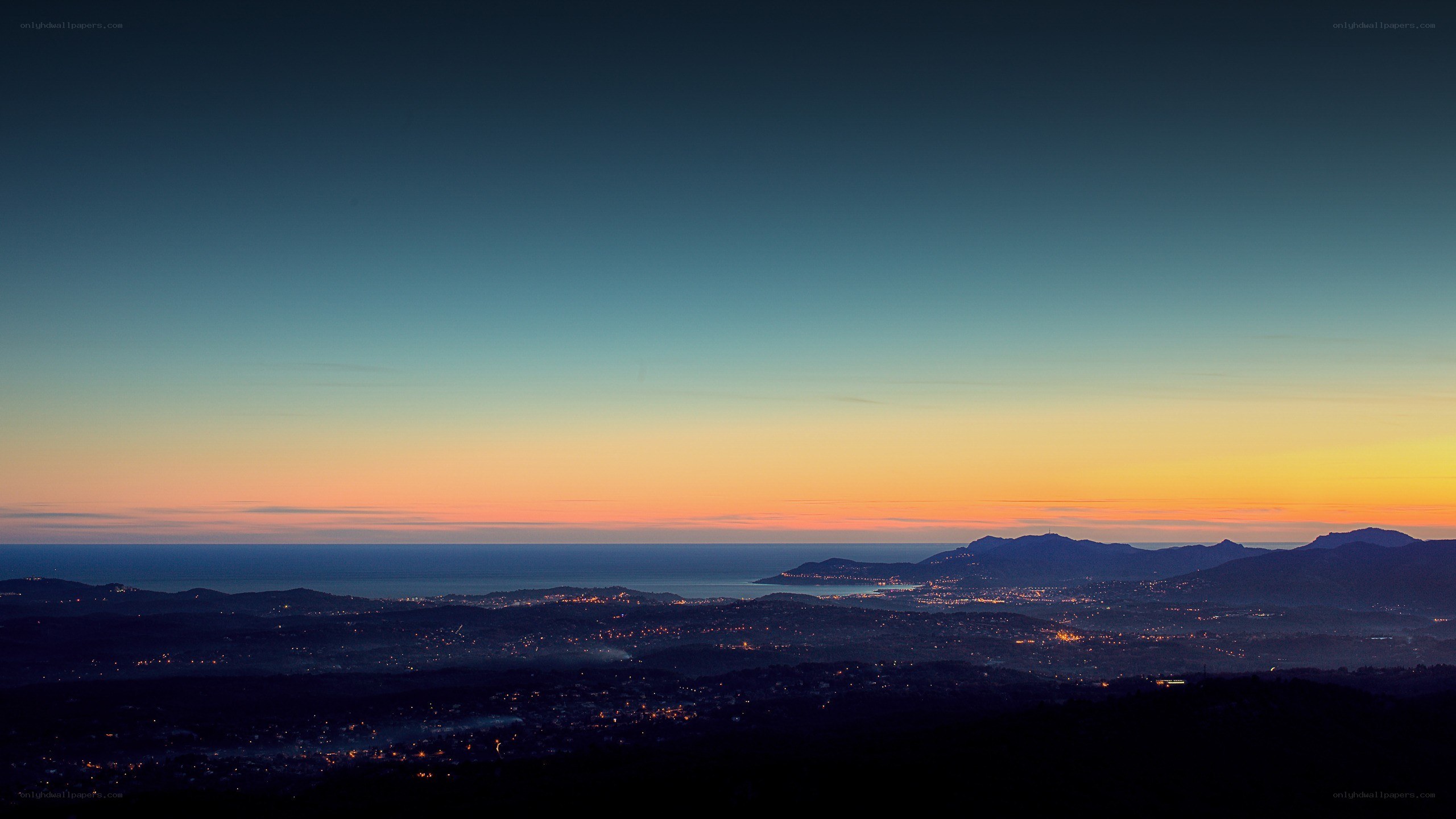 sunset over coastal hills