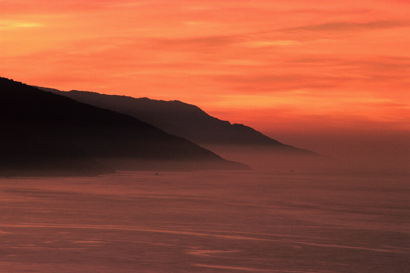 Sunset over coastal hills