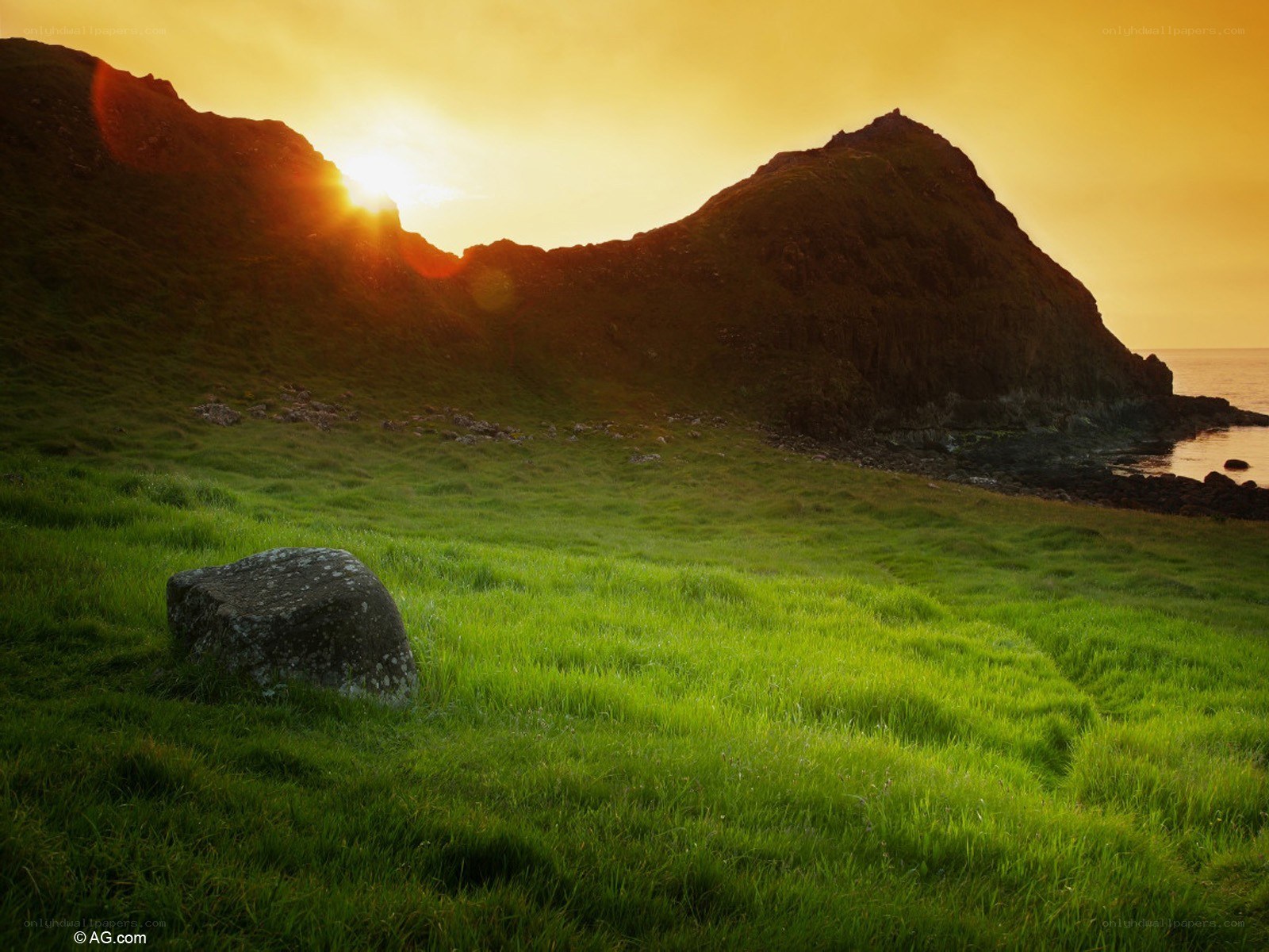 Sunset over coastal hills
