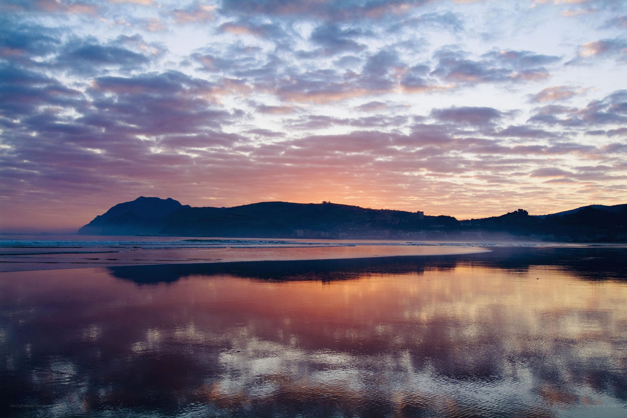 Sunset over coastal hills