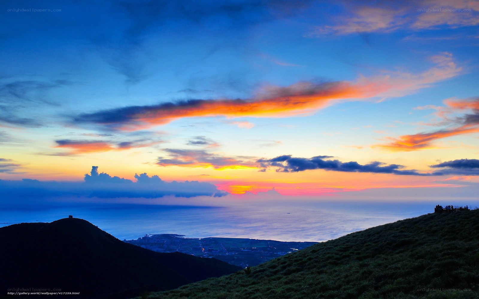 Sunset over coastal hills