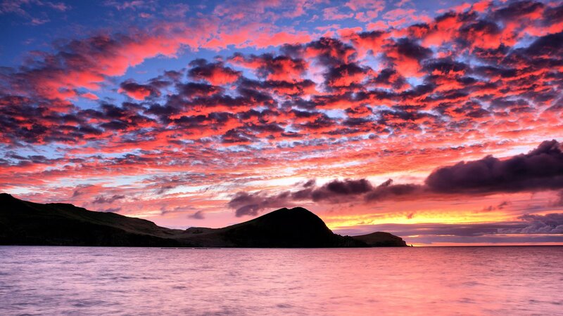 Sunset over Coastal Hills — Red, Dramatic, Photograph, Sea
