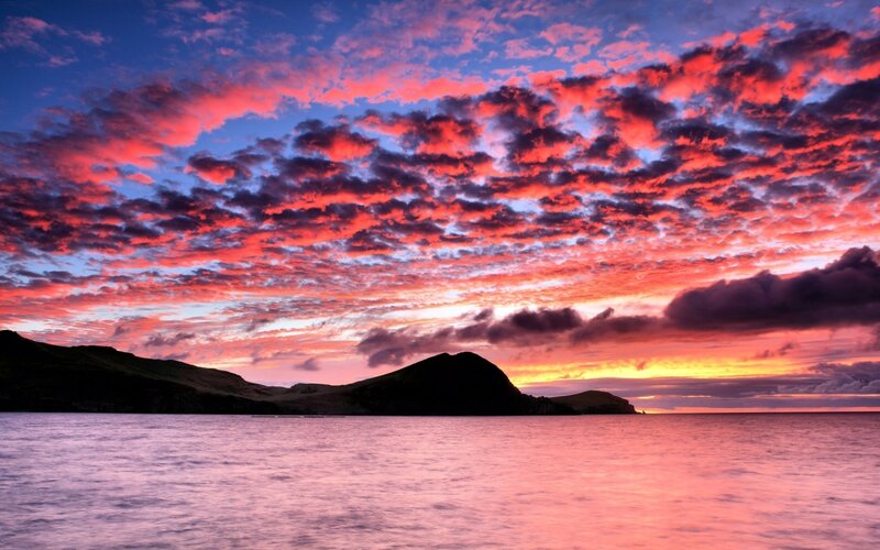 Sunset over Coastal Hills — Red, Dramatic