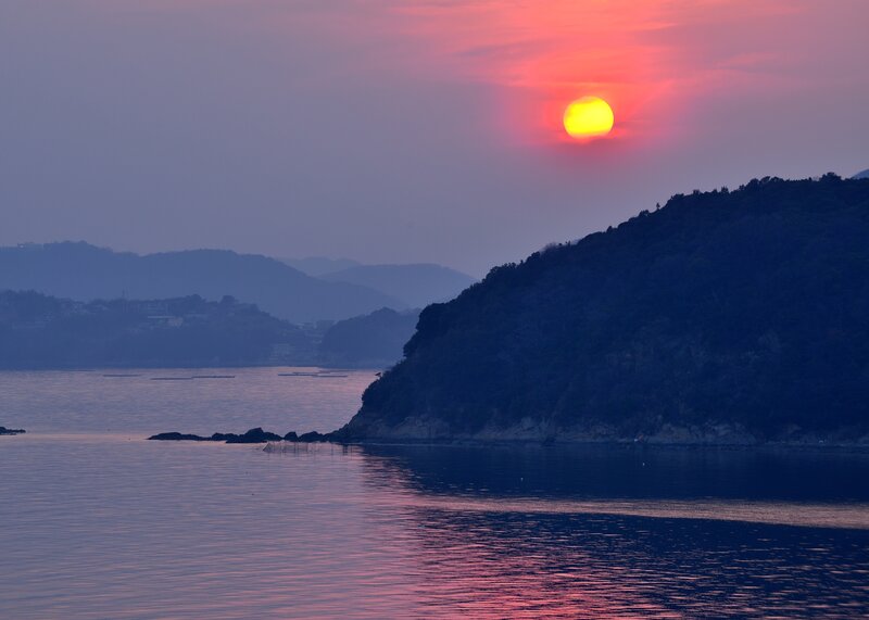 Sunset over Coastal Hills — Red, Serene