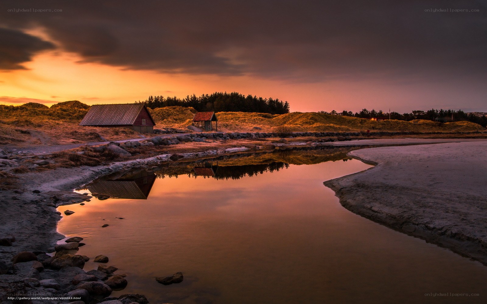 Sunset over coastal huts