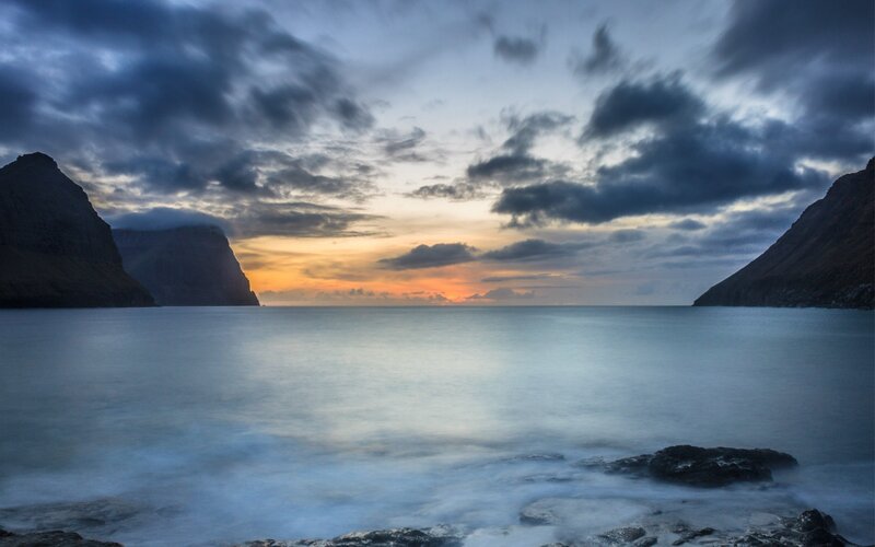 Sunset over Coastal Inlet — Blue, Dramatic, Photograph, Mountains
