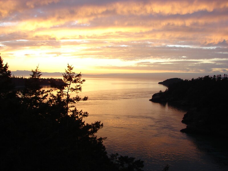 Sunset over Coastal Inlet — Orange, Serene