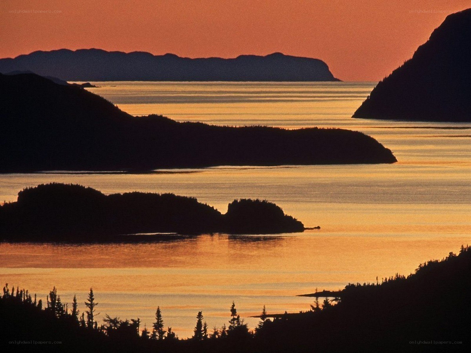 sunset over coastal islands