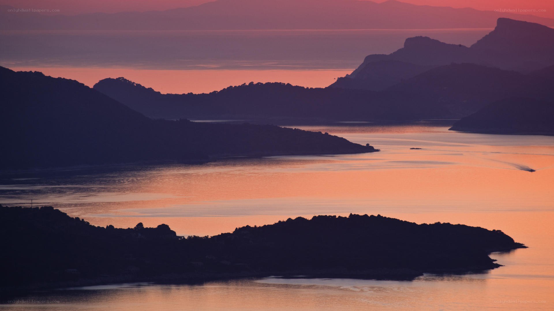 sunset over coastal islands