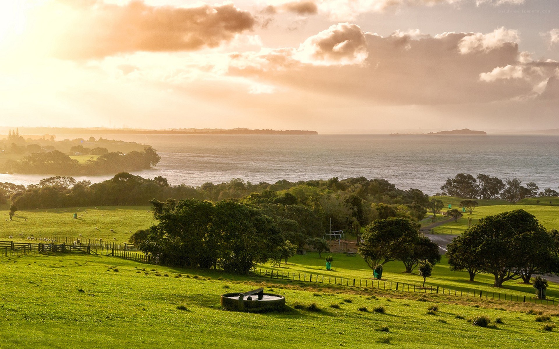 sunset over coastal landscape