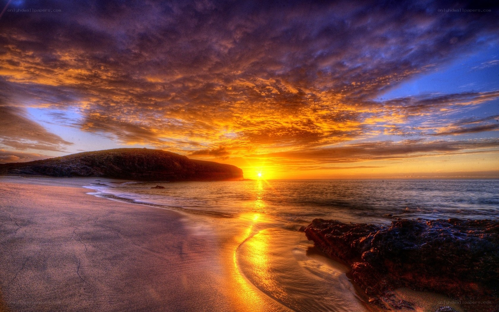 sunset over coastal landscape