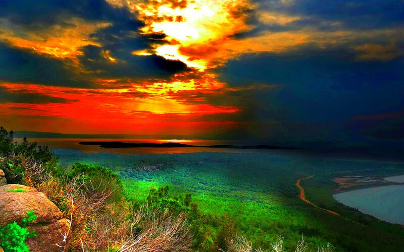 Sunset over Coastal Landscape — Orange
