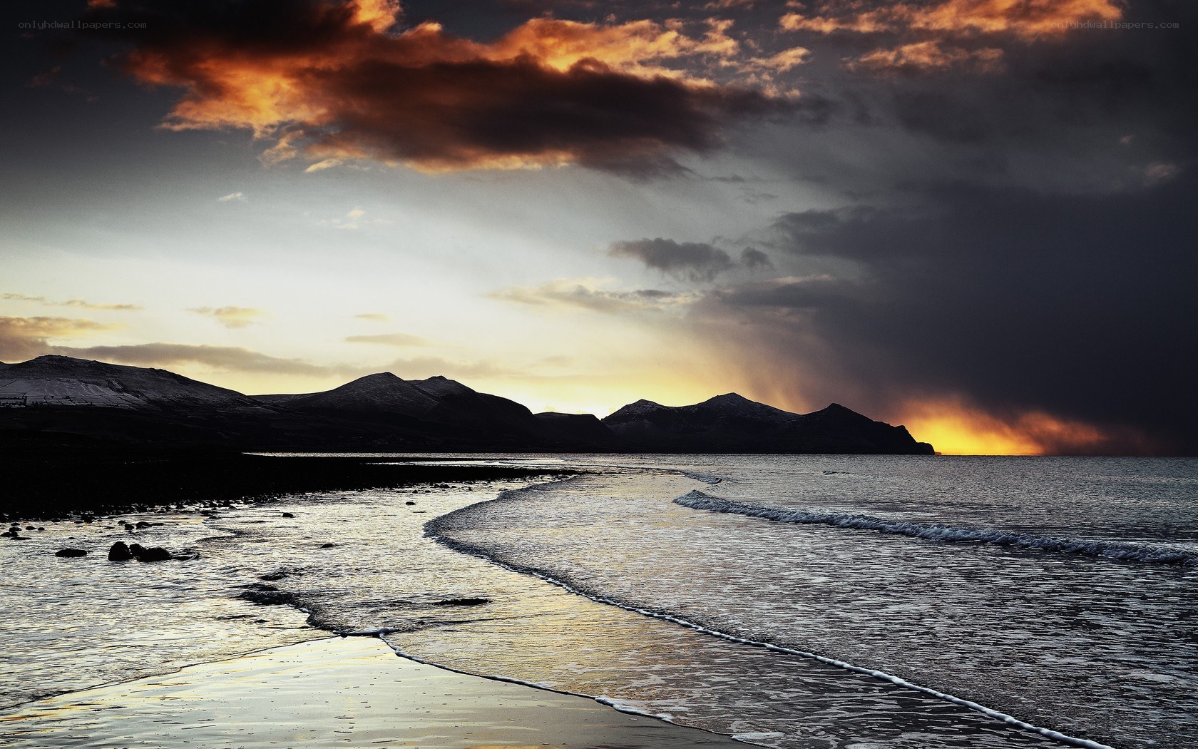 Sunset over coastal mountains