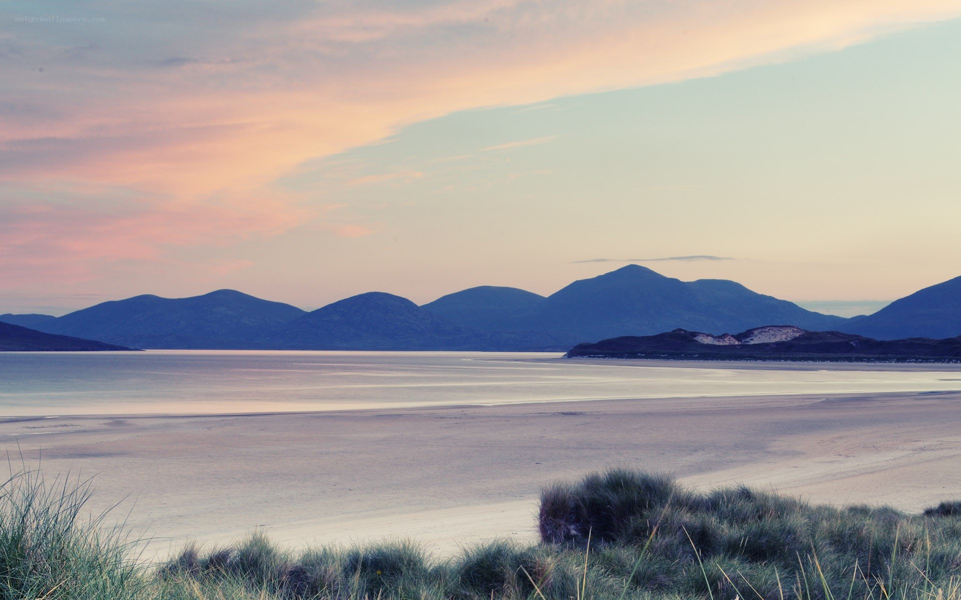 sunset over coastal mountains