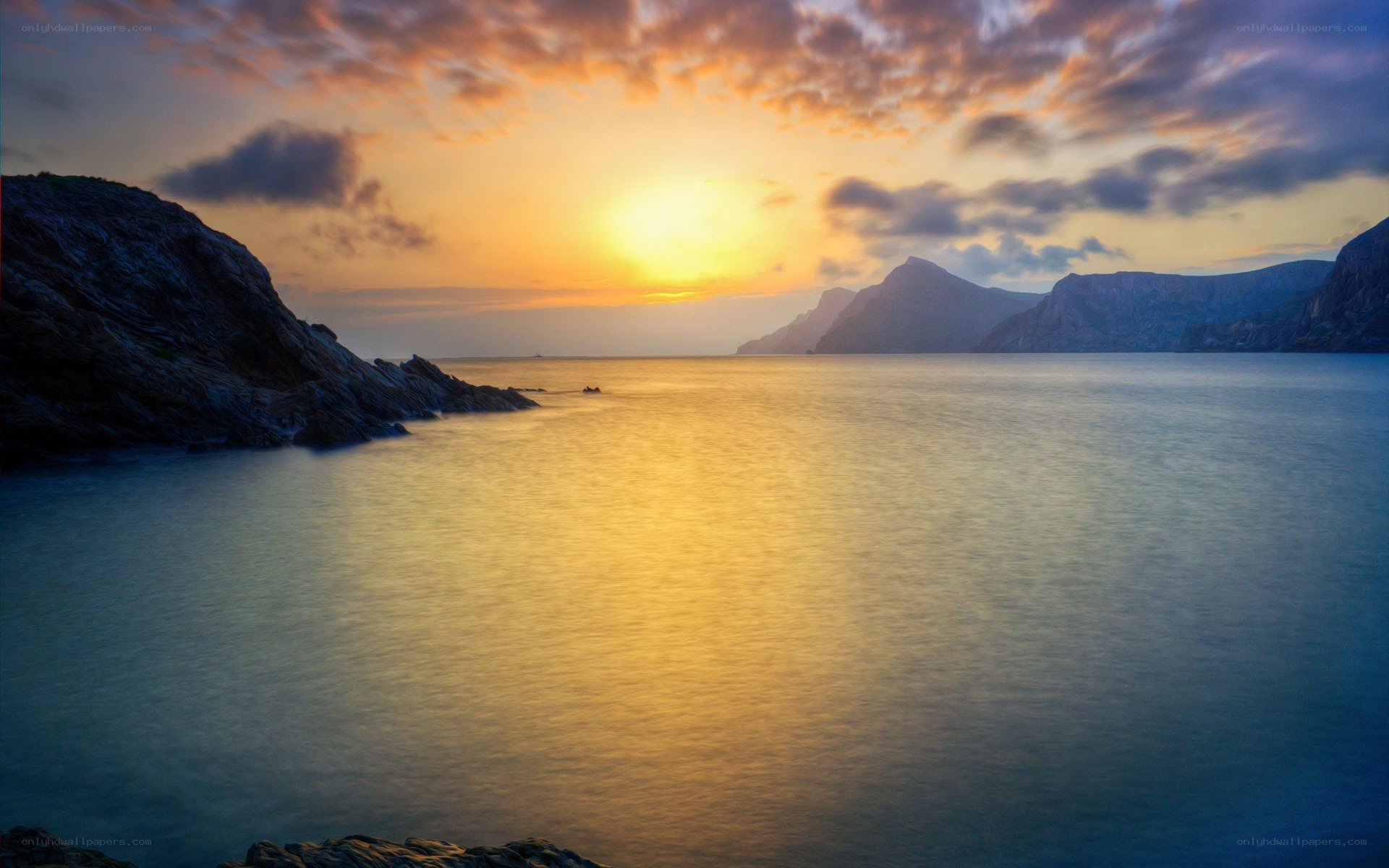 Sunset over coastal mountains