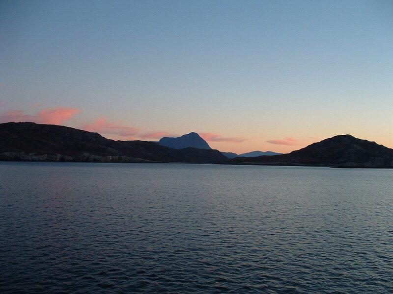 sunset over coastal mountains