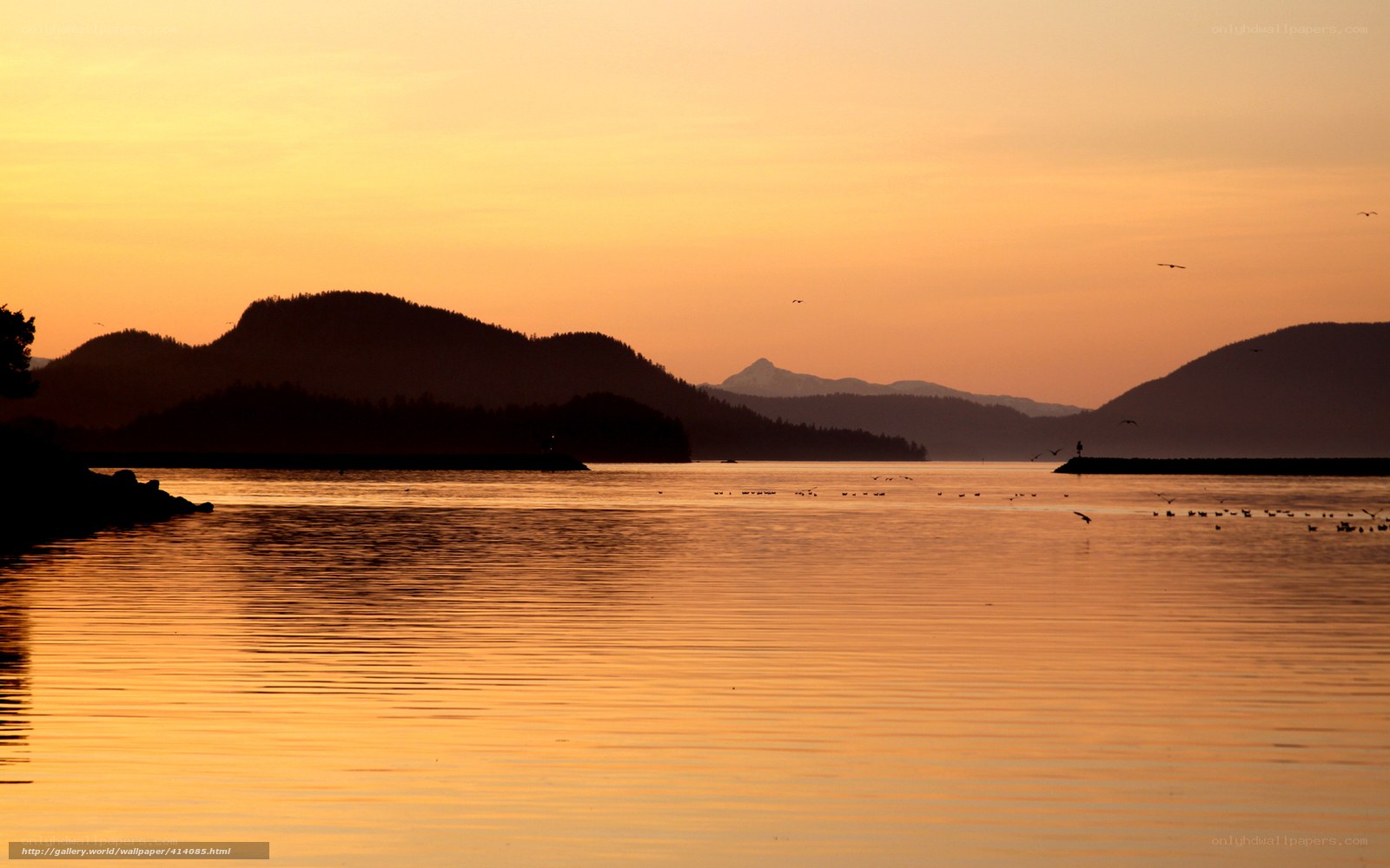 sunset over coastal mountains