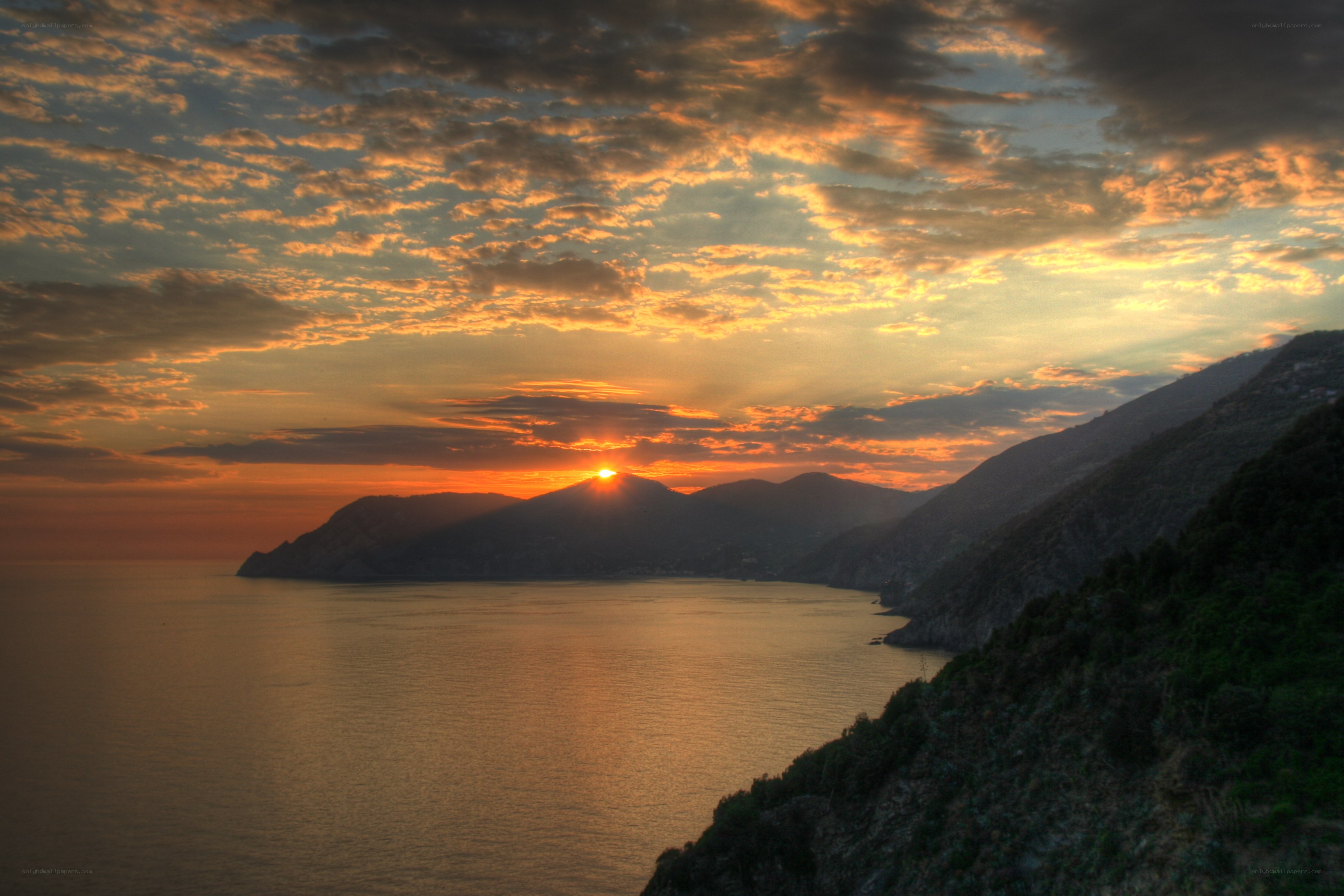 Sunset over coastal mountains