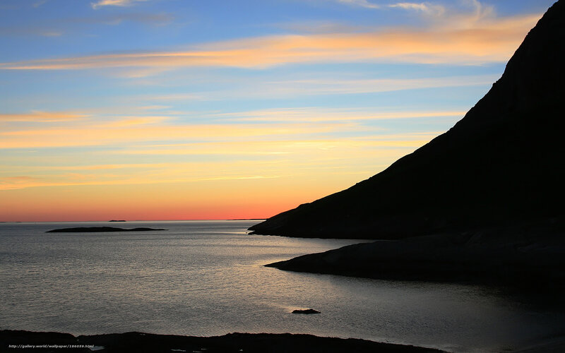 sunset over coastal mountains