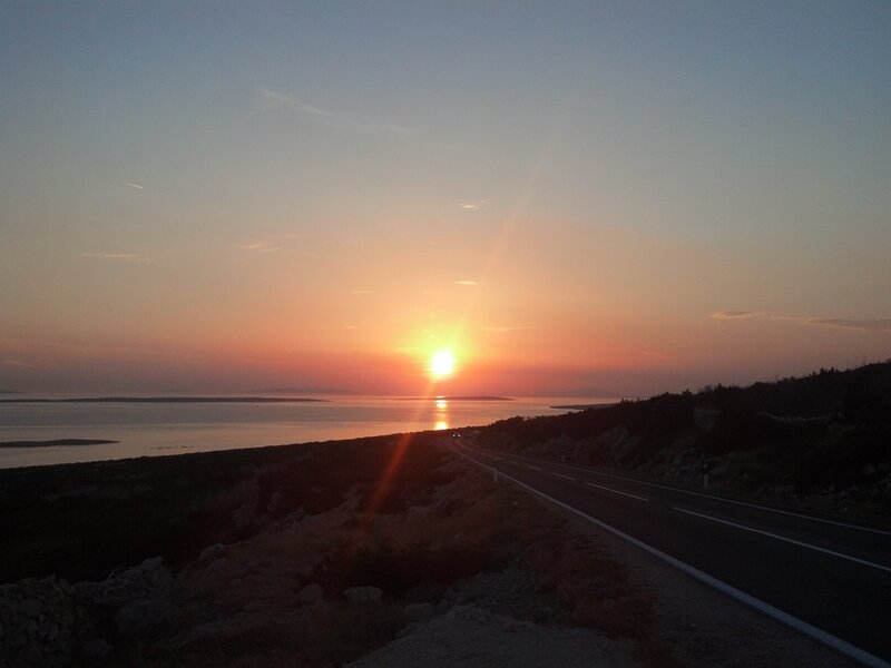 Sunset over Coastal Road — Orange