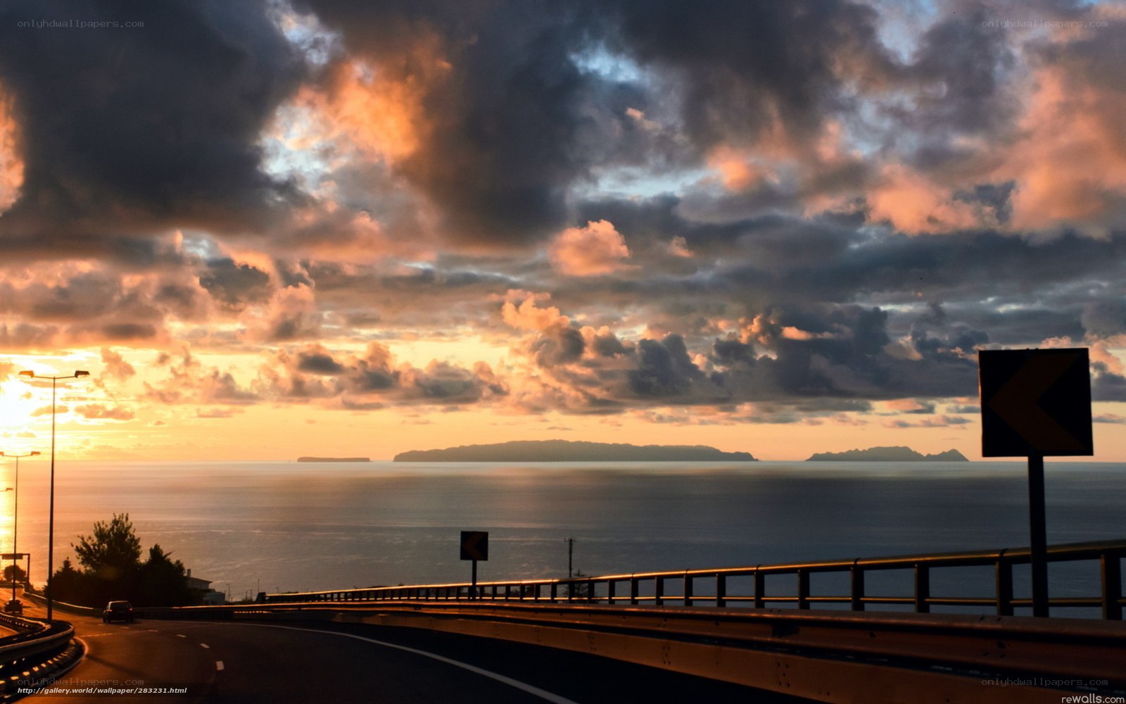 Sunset over coastal road