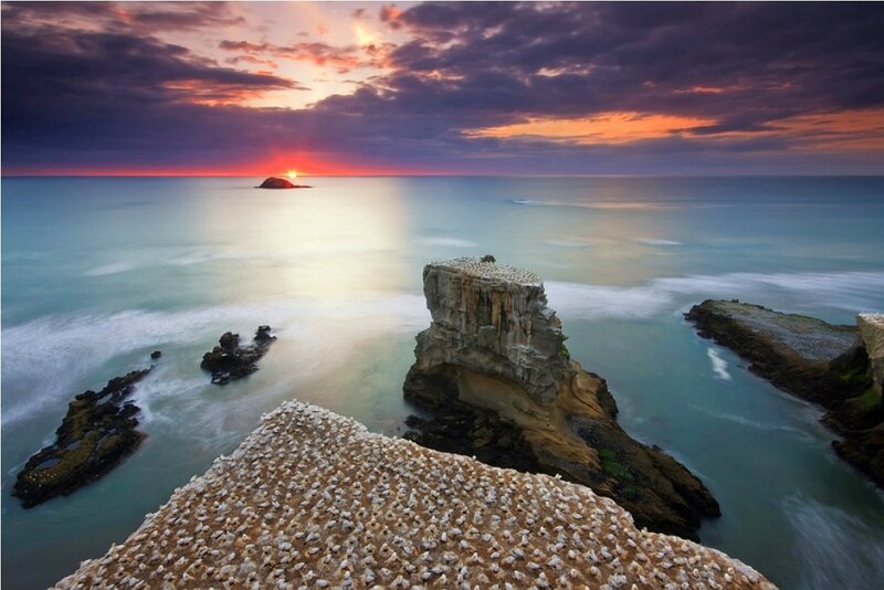 Sunset over coastal rock formations