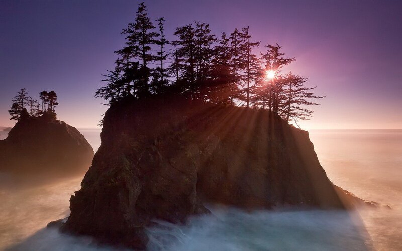 Sunset over coastal rock formations